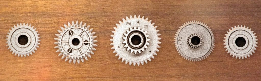 Cogs side by side on a table
